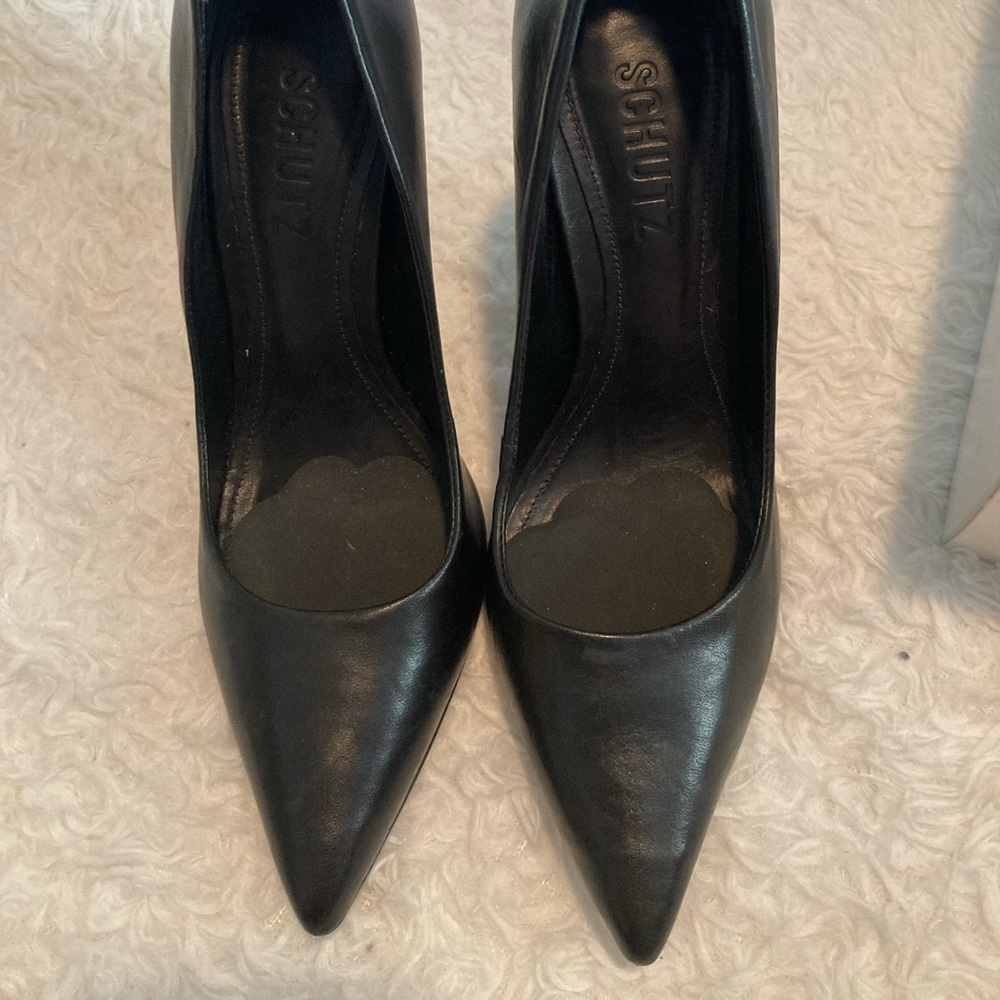 Schutz 7.5B. Gilbert’s black high heel shoes .